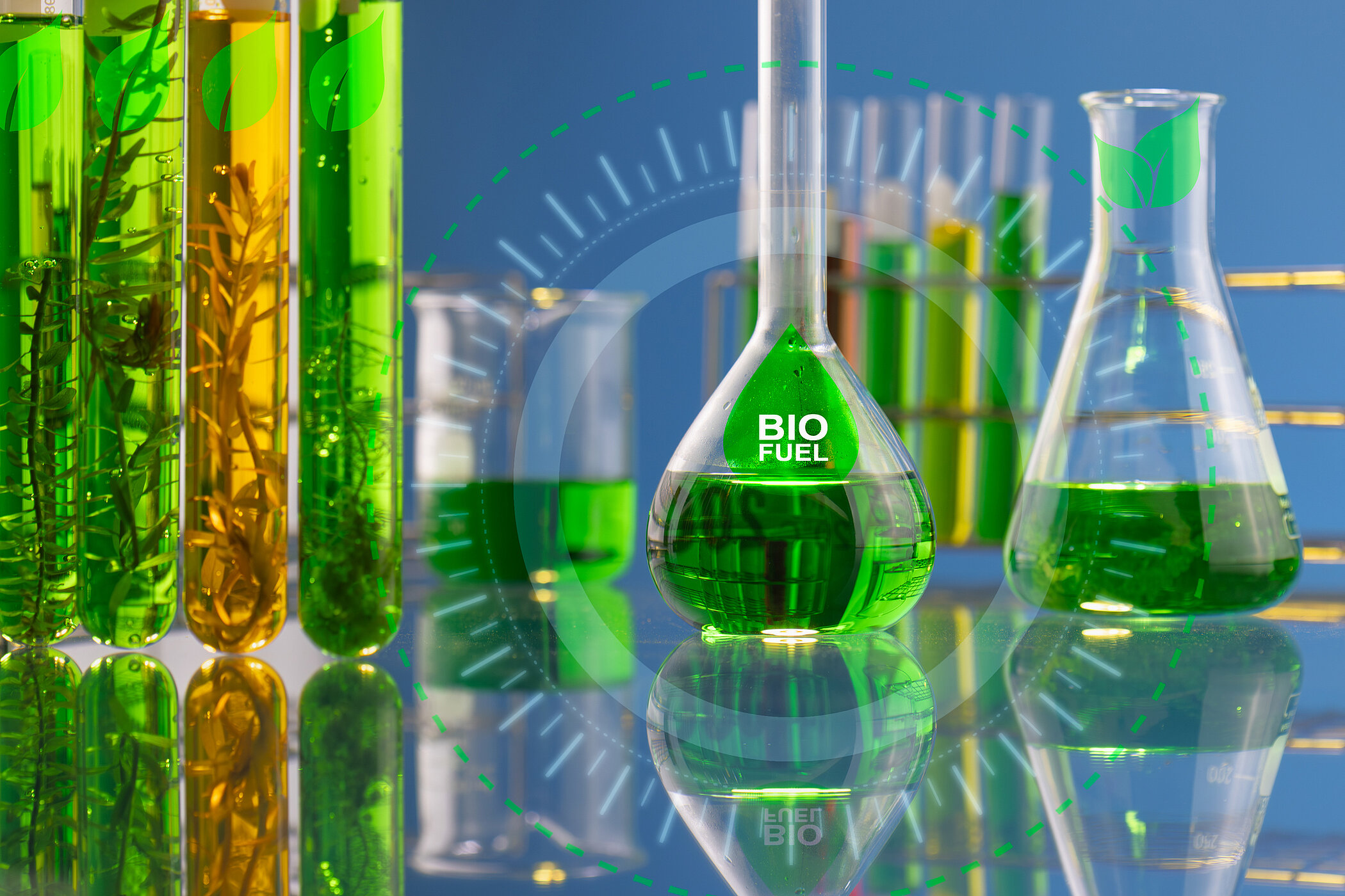 Chemical glass containers containing a green liquid (iStock: Toa55)