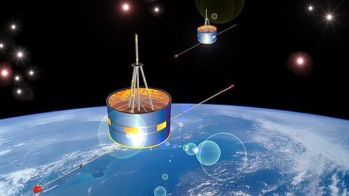 Two drum-shaped satellites with long, thin booms are flying one behind the other in space. In the background, the light-blue globe of Earth, with bands of clouds, is visible beneath a black, star-studded sky.