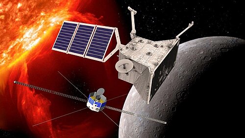 The image shows the BepiColombo flying above mercury with the sun in the background on the left.