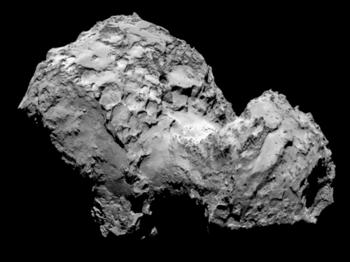 Shows Comet 67P/Churyumov-Gerasimenko, an irregularly shaped celestial body with many craters.