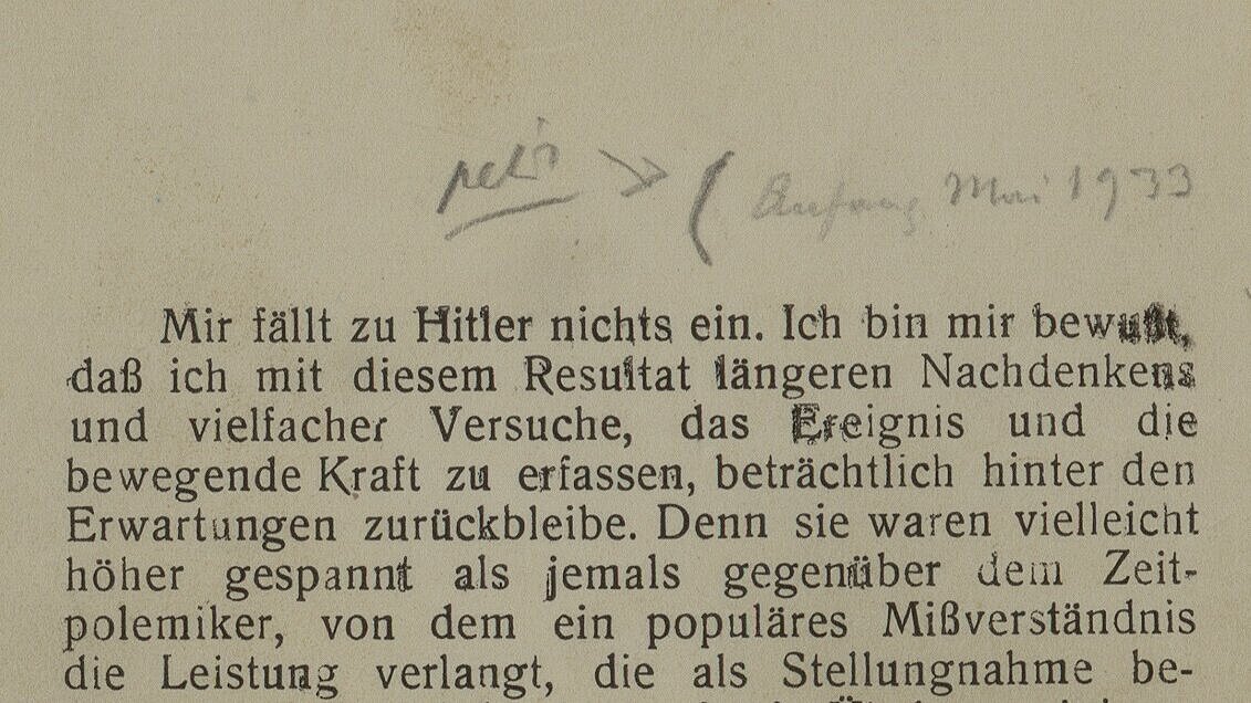 part of a scanned page with printed text and a note in pencil on top of the page. The writing is not legible, apart from the date May 1933.