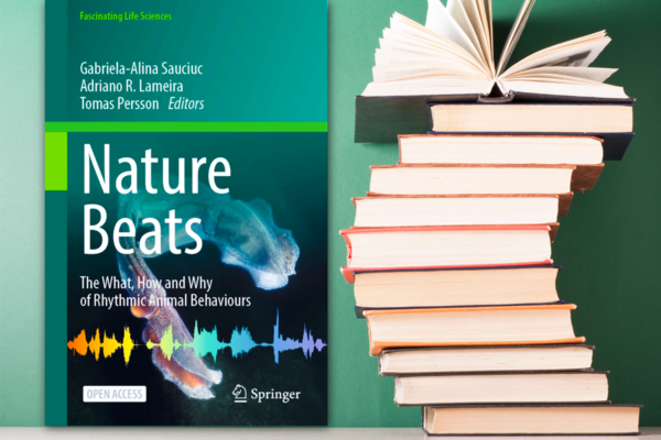 Book cover of Nature Beats: The What, How and Why of Rhythmic Animal Behaviours, displayed against a background of stacked books.