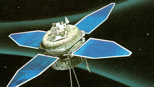 A large, cylindrical satellite with four outstretched blue solar panel wings hovers in the dark expanse of space. Diagonally below it flies a much smaller, spider-like companion satellite with long measuring antennas.