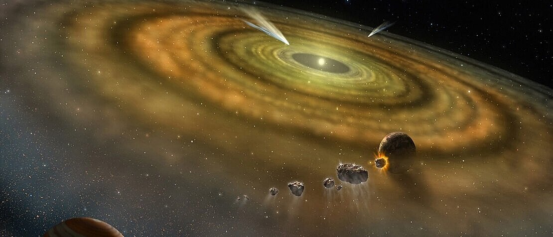 A colorful artistic rendering shows the formation of a planetary system around a young star. Amid a vast, rotating disk of gas and dust, the first planets and asteroids are forming, while comets pass through the system.